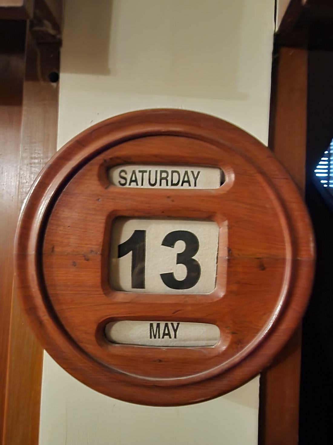 A wooden wall calendar