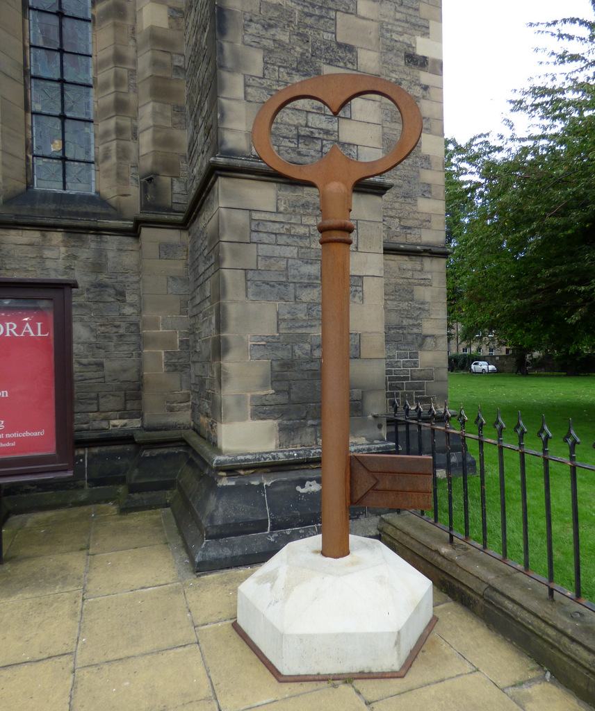 A large old door key